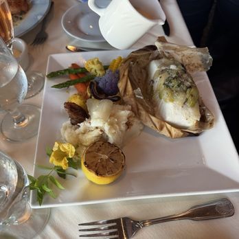 Bay View Restaurant & Lounge - Halibut in parchment paper with Champagne butter sauce, and a lovely assortment, of vegetables - Seafood Near Me - Bodega Bay, California