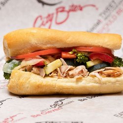 Grilled turkey breast, melted provolone, grilled veggie mix, tomatoes, City Bites' ranch dressing, salt & pepper.
