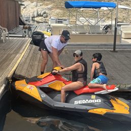 Friendly staff helping us with our Jet Ski rental