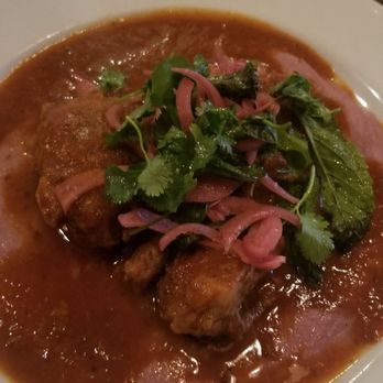 Spuntino - Duroc pork cheeks on bed of blue corn polenta - Italian Near Me - Denver, Colorado Spuntino - Duroc pork cheeks on bed of blue corn polenta - Italian Near Me - Denver, Colorado