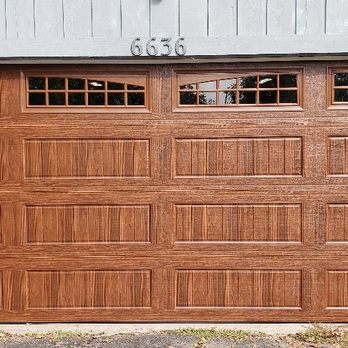 Monroe Overhead Door Company - This is an Amarr, Designers Choice garage door with a faux wood finish. - Garage Door Services Near Me Monroe Overhead Door Company - This is an Amarr, Designers Choice garage door with a faux wood finish. - Garage Door Services Near Me