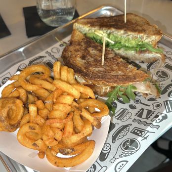 Milkhouse - club sandwich + curly fries - American Near Me - Orlando, Florida