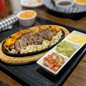 Mexican Amigos - a platter of food on a table - Mexican Near Me - Richmond Hill, Ontario Mexican Amigos - a platter of food on a table - Mexican Near Me - Richmond Hill, Ontario