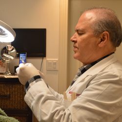 Beautique Medical Spa - Dr. Sanchez preparing to inject Botox.
