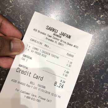 Sarku Japan - a hand holding a receipt - Japanese Near Me - Brandon, Florida Sarku Japan - a hand holding a receipt - Japanese Near Me - Brandon, Florida