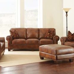 Zoe's Furniture - 100% leather living room set