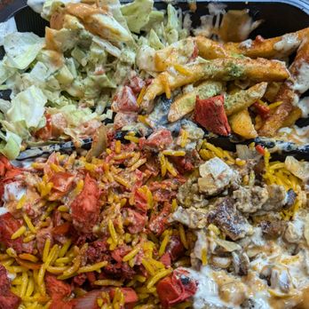 NYC Halal Eats - My food once you get through the mountain of sauces - Halal Near Me - Farmington Hills, Michigan