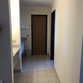 Breakers Resort - Hallway to bathroom of family room. - Hotels Near Me - Saint Ignace, Michigan