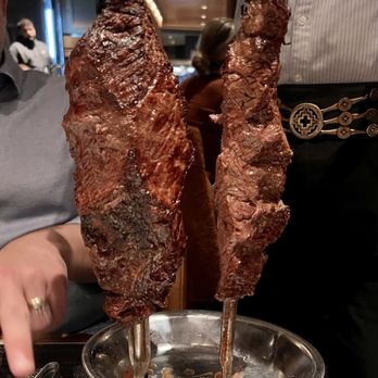 Fogo de Chão - two skewers of meat - Brazilian Near Me - Wayne, New Jersey