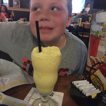 Buffalo Wild Wings - Orange mango slush ice wasn't blended enough couldn't drink it out of a straw. But kids love anything. - Chicken Wings Near Me - Visalia, California