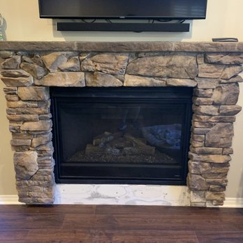 StoneAge Masons - Fireplace stone needing repair after floor installation - Masonry/Concrete Near Me StoneAge Masons - Fireplace stone needing repair after floor installation - Masonry/Concrete Near Me