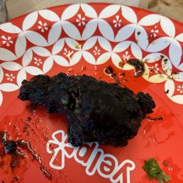 A jerk chicken wing A jerk chicken wing
