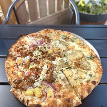 Creekbread - Half mopsy's kalua pie, half pemberton potato pie - Pizza Near Me - Whistler, British Columbia