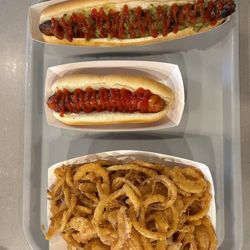 Juniors Hot Dogs - Footlong hot dog, regular hot dog, and a large side of onion rings