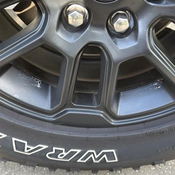 Universal Tire & Auto - In between the spokes you can see the scrapes to the matte black finish. This is consistent on all wheels in exactly the same place. - Auto Repair Near Me - Longwood, Florida Universal Tire & Auto - In between the spokes you can see the scrapes to the matte black finish. This is consistent on all wheels in exactly the same place. - Auto Repair Near Me - Longwood, Florida