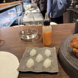 Pickled daikon (palate cleanser) and hot yuzu honey Pickled daikon (palate cleanser) and hot yuzu honey