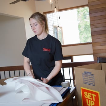 Matco Moving Solutions - Jessica packing fragile items. - Movers Near Me - Edmonton, Alberta