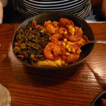 Herbe Sainte - Blackened shrimp and cheesy grits with collard greens - Cajun/Creole Near Me - Omaha, Nebraska Herbe Sainte - Blackened shrimp and cheesy grits with collard greens - Cajun/Creole Near Me - Omaha, Nebraska