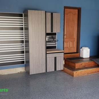 GarageExperts of Madison - a garage with blue walls - Flooring Near Me - Sun Prairie, Wisconsin