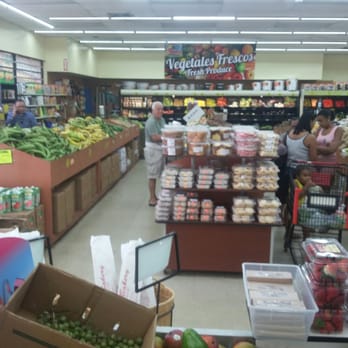Huracan Supermarket - a woman shopping in a grocery store - Butcher Near Me - Tampa, Florida Huracan Supermarket - a woman shopping in a grocery store - Butcher Near Me - Tampa, Florida