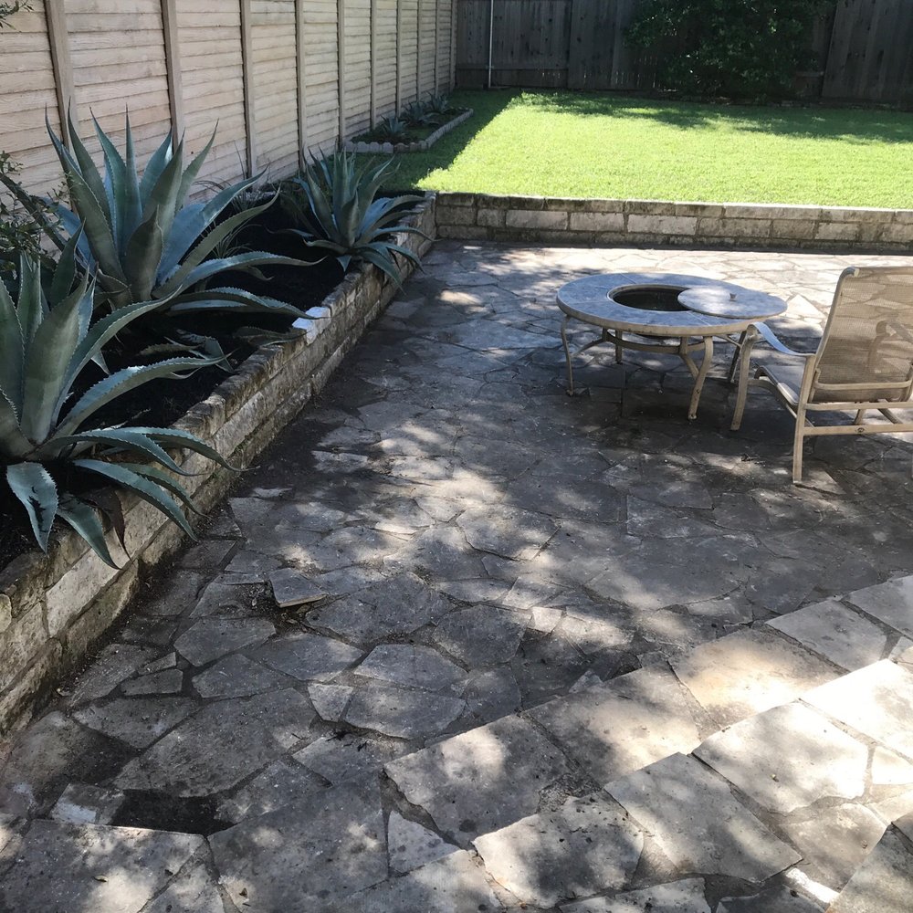 Lenox Landscaping & Irrigation - a patio with a table and chairs - Tree Services Near Me - Round Rock, Texas
