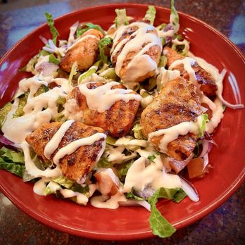 Eat A Pita - Chicken Souvlaki... served with rice, lettuce, tomatoes, onions, pickles, pepperoncinis, and your choice of yellow sauce or tahini sauce. - Mediterranean Near Me - Rancho Cordova, California Eat A Pita - Chicken Souvlaki... served with rice, lettuce, tomatoes, onions, pickles, pepperoncinis, and your choice of yellow sauce or tahini sauce. - Mediterranean Near Me - Rancho Cordova, California