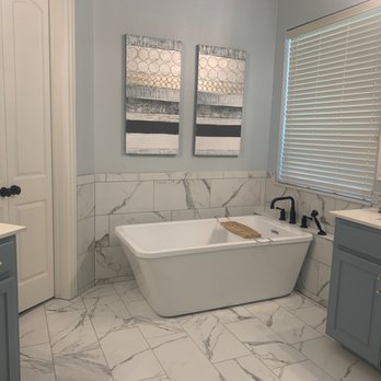 A-Ward Custom Installations - Stunning marble installed on the floor and walls, with new tub installation. - Flooring Near Me - Arlington, Texas A-Ward Custom Installations - Stunning marble installed on the floor and walls, with new tub installation. - Flooring Near Me - Arlington, Texas