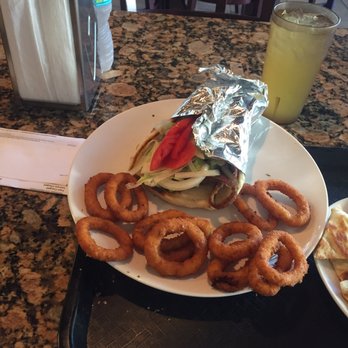 The Gyro Joint - Lamb gyro and onion rings. Good portion .. so yummy .. I am still craving. - Greek Near Me - Pompano Beach, Florida The Gyro Joint - Lamb gyro and onion rings. Good portion .. so yummy .. I am still craving. - Greek Near Me - Pompano Beach, Florida