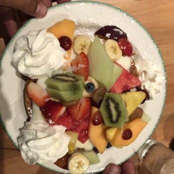 Cora - a plate of fruit and whipped cream - Breakfast & Brunch Near Me - Granby, Quebec