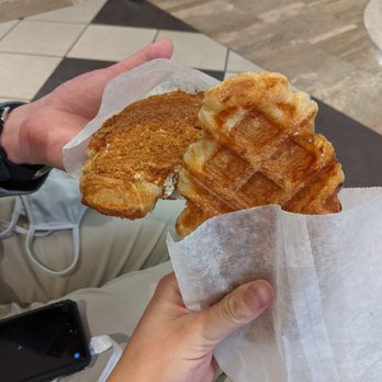 Hey Croffle - a person holding a half eaten sandwich - Coffee & Tea Near Me - Edmonton, Alberta Hey Croffle - a person holding a half eaten sandwich - Coffee & Tea Near Me - Edmonton, Alberta