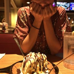 Cute girl with a Skillet Chocolate Chip Cookie