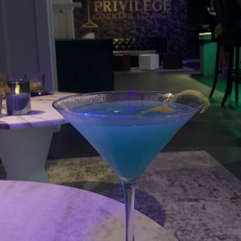 Privilege Cocktail Lounge - a blue cocktail in a martini glass - Cocktail Bars Near Me - Miami Beach, Florida Privilege Cocktail Lounge - a blue cocktail in a martini glass - Cocktail Bars Near Me - Miami Beach, Florida