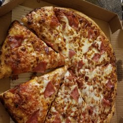 Pizza Hut - This is how my pizza was given to me this ridiculous and there's no sauce  Very little topping