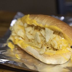Doggiestyle Hot Dogs - Puerto Rican style dog - nacho cheese and crumbled potato chips.  I love this one!
