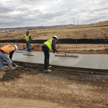 Aguirre Constructors - construction workers working on a concrete slab - Masonry/Concrete Near Me - Commerce City, Colorado Aguirre Constructors - construction workers working on a concrete slab - Masonry/Concrete Near Me - Commerce City, Colorado