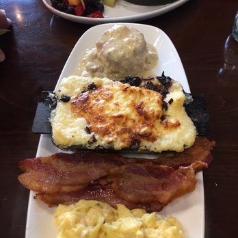 The Flipside Cafe - Daily special - 2 eggs, bacon, grits & biscuit w/ sausage gravy. Had eggs softly scrambled & upgraded grits to Carolina Grits. - Breakfast & Brunch Near Me - Fort Mill, South Carolina