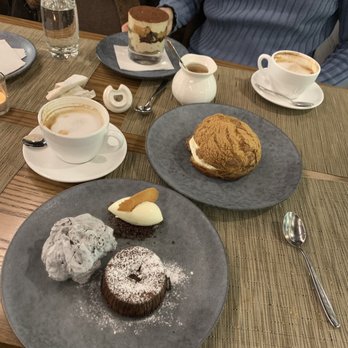 Terre Rouge - Lava cake unreal!, tiramisu at the far end another hit, and their new desert: Choux puff pastry goodness in the middle, 3/3. - French Near Me - Markham, Ontario