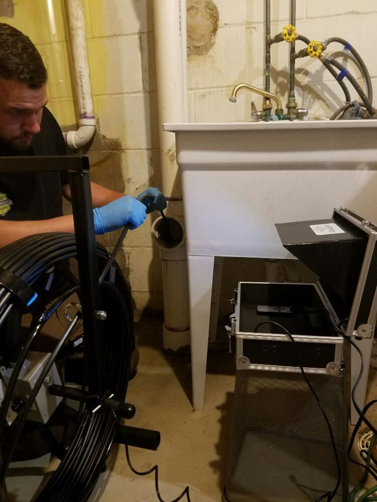 Slide of Rimbey's Drain Cleaning