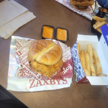 Zaxbys - Spicy Zack's chicken sandwich with french fries seasoned fries. - Chicken Wings Near Me - Charlotte, North Carolina Zaxbys - Spicy Zack's chicken sandwich with french fries seasoned fries. - Chicken Wings Near Me - Charlotte, North Carolina