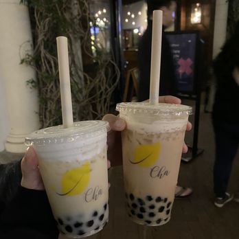 Cha For Tea - Honey Green Milk Tea Regular Size w Boba (Left) Almond Black Milk Tea Large Size w Boba (Right) - Coffee & Tea Near Me - Irvine, California Cha For Tea - Honey Green Milk Tea Regular Size w Boba (Left) Almond Black Milk Tea Large Size w Boba (Right) - Coffee & Tea Near Me - Irvine, California