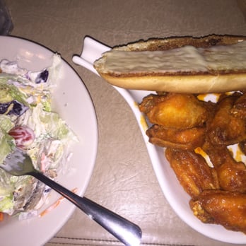 Poor Richards - Hot wings, side salad, garlic cheese bread. - Sports Bars Near Me - Fenton, Missouri