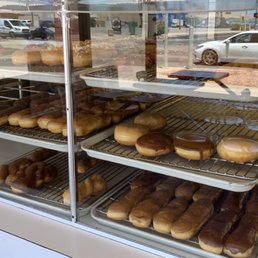 a display case full of doughnuts
