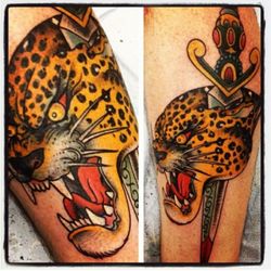Black Bones Tattoo - Leopard and dagger I did in Seattle.