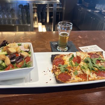 Old Town Pour House - Hot honey Flatbread w/side house salad. Sofie beer from Goose Island - American Near Me - Naperville, Illinois Old Town Pour House - Hot honey Flatbread w/side house salad. Sofie beer from Goose Island - American Near Me - Naperville, Illinois