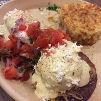Snooze, an A.M. Eatery - The eggs Benedict (the menu option where you pick two types). We got the and the chilaquiles Benedict and the chile verde benny) - Breakfast & Brunch Near Me - Centennial, Colorado