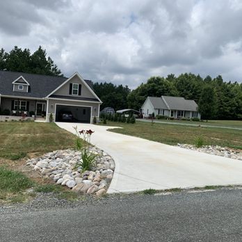 SMP Builders - a driveway leading to a house - General Contractors Near Me SMP Builders - a driveway leading to a house - General Contractors Near Me