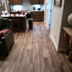 Crusaders Construction - corked back laminate flooring installation