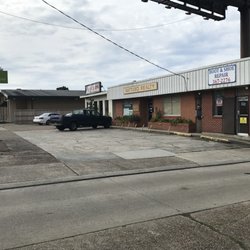 Moran's Boot & Shoe Repair - View of Moran's Boot & Shoe Repair from the Westbank Expressway, lower level.