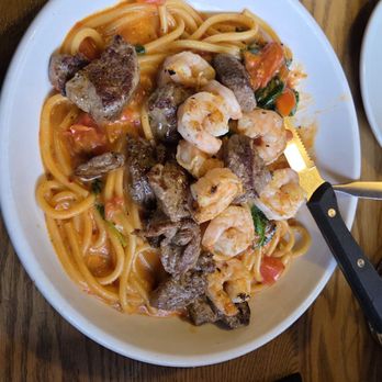 Olive Garden Italian Restaurant - Calabrian Steak & Shrimp Bucatini - Italian Near Me - Cherry Hill, New Jersey Olive Garden Italian Restaurant - Calabrian Steak & Shrimp Bucatini - Italian Near Me - Cherry Hill, New Jersey
