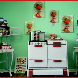 The Jam & Jelly Lady - That adorable Eureka stove surrounded by great wall art and local coffee.